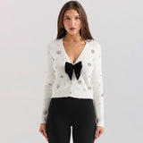 Luxurious Crystal V Neck Button Up Sleeved Bow Trim Ribbed Knit Cardigan
